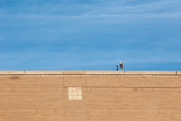 Obraz premium Old brick building with blue sky