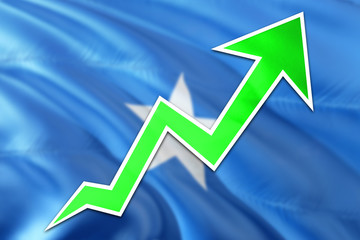 Somalia economy graph is indicating positive growth, green arrow going up with trend line. Business concept on national background.