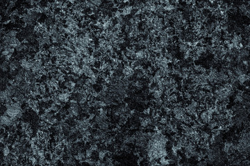 Fototapeta na wymiar Black stone background in abstract style. Old dirty wall texture, rough dark marble. Rock grunge surface. Black&white art.
