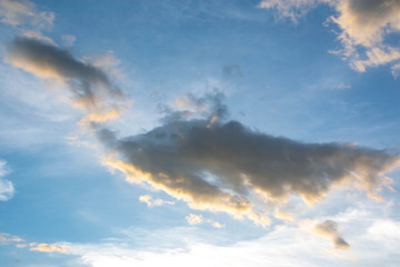 Sunset And a gray cloud with a blue sky