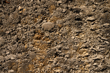 Textured ground surface as background, top view