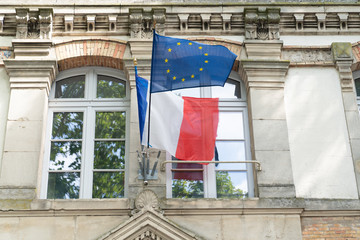 french and europe flag in city hall in town center France