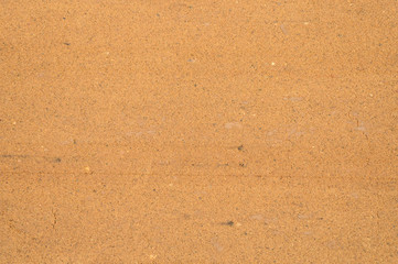 Textured sand surface as background, top view