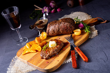 Butter Beef Steak with herbs and potato wedges