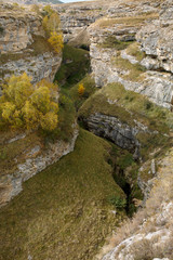 Photo from above of mountainous terrain, hills, vegetation