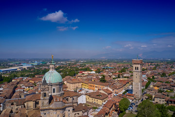 Fototapeta na wymiar Aerial photography with drone. Church Parrocchia della Nativita di San Giovanni Battista on the mountain in the city of Lonato, Italy