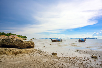 Beach side with sea view and boat at Tub Kaek Beach Krabi Province, Thailand.