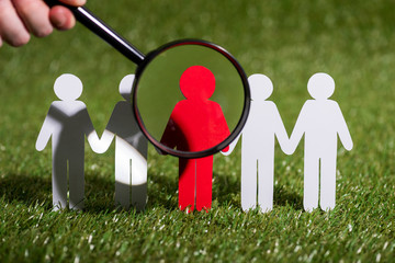 Human resource management and recruitment business concept. Paper cut of people on the green background