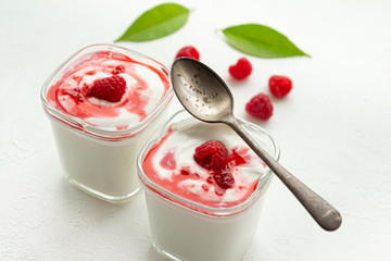 Natural yogurt with fresh raspberries