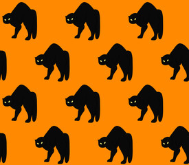 Halloween seamless pattern design with black cat. Isolated vector illustration