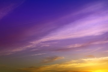 pretty unreal vivid fantasy sunset or sunrise clouds in the sky for using in design as background.