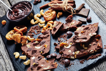 close-up of sweet chocolate bar with cashew
