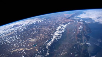 Planet Earth seen from the ISS. Space exploration of planet Earth at night. Elements of this video furnished by NASA.