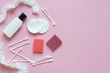 Obraz na płótnie Canvas Beautiful flatlay hygienic and women's accessories on pink with place for text. Hygiene, femininity, medicine, health care concept