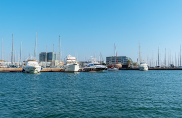 Fototapeta na wymiar Group of yachts and boats in the marina port