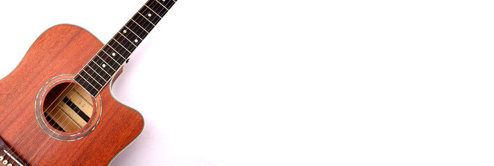 Top view of Acoustic guitar on white background and copy space.