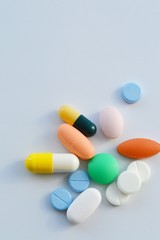 pills and bottle on white background