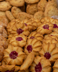 Shortbread cookies with a drop of jam, curabier dessert vertical background