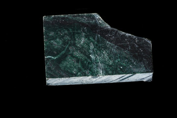 Fototapeta premium Macro stone Nephrite mineral on black background