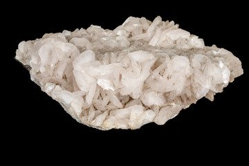 Macro stone Calcite mineral on a black background