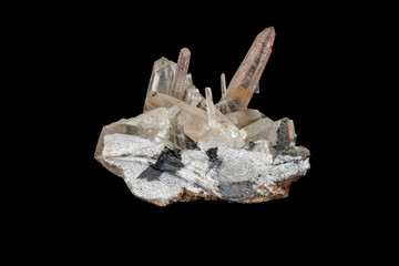 Macro stone mineral Quartz crystals on a black background