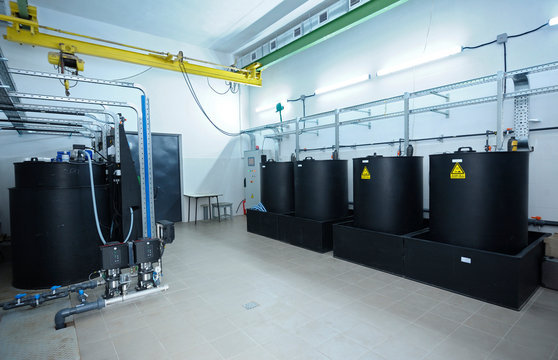 At The Dosing Systems Hall Of The Water Pumping Station: Sodium Hypochlorite Storage Tanks And Dosing System