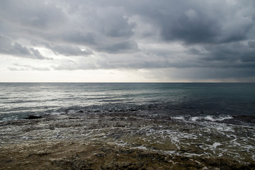Fototapeta na wymiar Stormy landscape in the sea shore