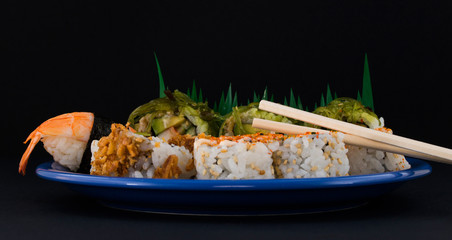 A plate of sushi. Chinese food.