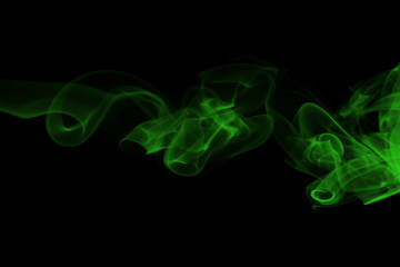green smoke abstract on black backgroud