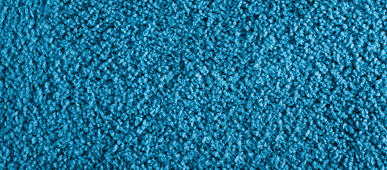 Texture of blue carpet. Panorama. View from above.