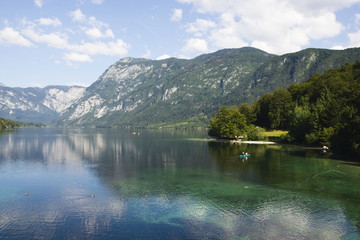 A beautiful view of Lake Bohinj in Slovenia and its surrounding mountains