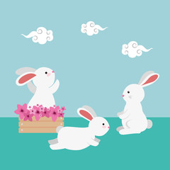 cute and little rabbits group with floral wooden box