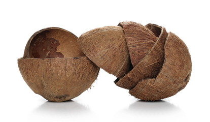 Coconut fruit shells cut in half isolated on white background, top view, design element 