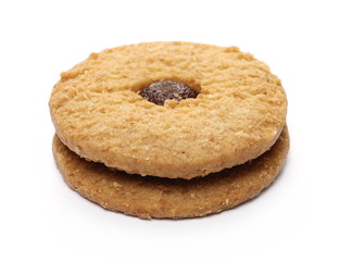 Integral cookie, biscuit with apricot jam filling isolated on white background