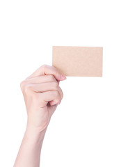Fototapeta premium Young asia clean girl hand holding a blank kraft brown paper card template isolated on white background, clipping path, close up, mock up, cut out