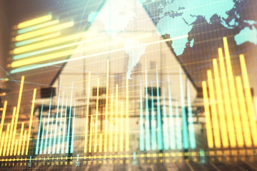 Obraz premium Double exposure of stock market graph with globe hologram on conference room background. Concept of international finance