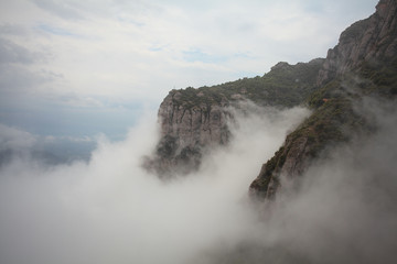 beautiful mountain in rising cloud