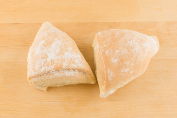 fresh pastry on a wooden tray