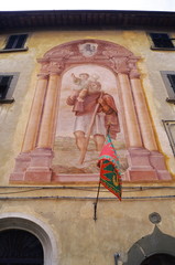 Fototapeta na wymiar Fresco of San Cristoforo in Piazza Vittorio Veneto in Fucecchio, Tuscany, Italy