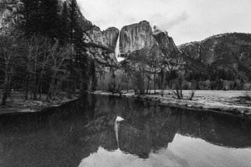Yosemite fall reflection with the water during winter season in black and white