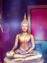 golden buddha statue, The face of gold buddha statue, Close up of the old Thai buddha with wooden...