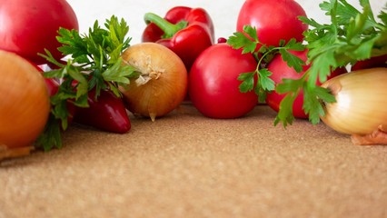 Vegetables on cork table. Bio Healthy food, herbs and spices. Organic vegetables on cork table