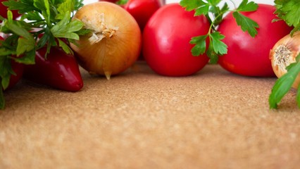 Vegetables on cork table. Bio Healthy food, herbs and spices. Organic vegetables on cork table