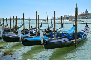 Obraz na płótnie Canvas Couple of Gondolas parked close to San Marco Square in Venice