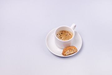 Cup of Espresso Coffee with Cantuccini Biscotti Breakfast Morning Coffee Blue Background Copy Space