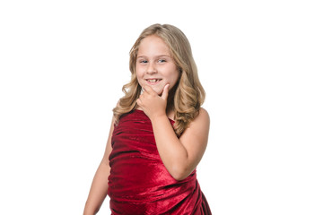 Little girl posing with red velvet dress on white background