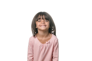 Portrait of a little brunette girl posing isolated on white background.
