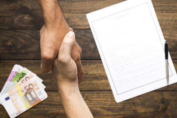 Top view men having an agreement hand posture