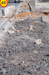 Repair the road. On the sidewalk lay tile.