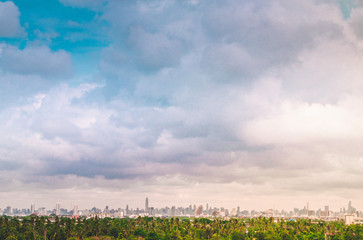 City. Architectural modern buildings in panoramic view on background .Tree nature area .the nature and modern city life. Urban concept .zoning idea save environment